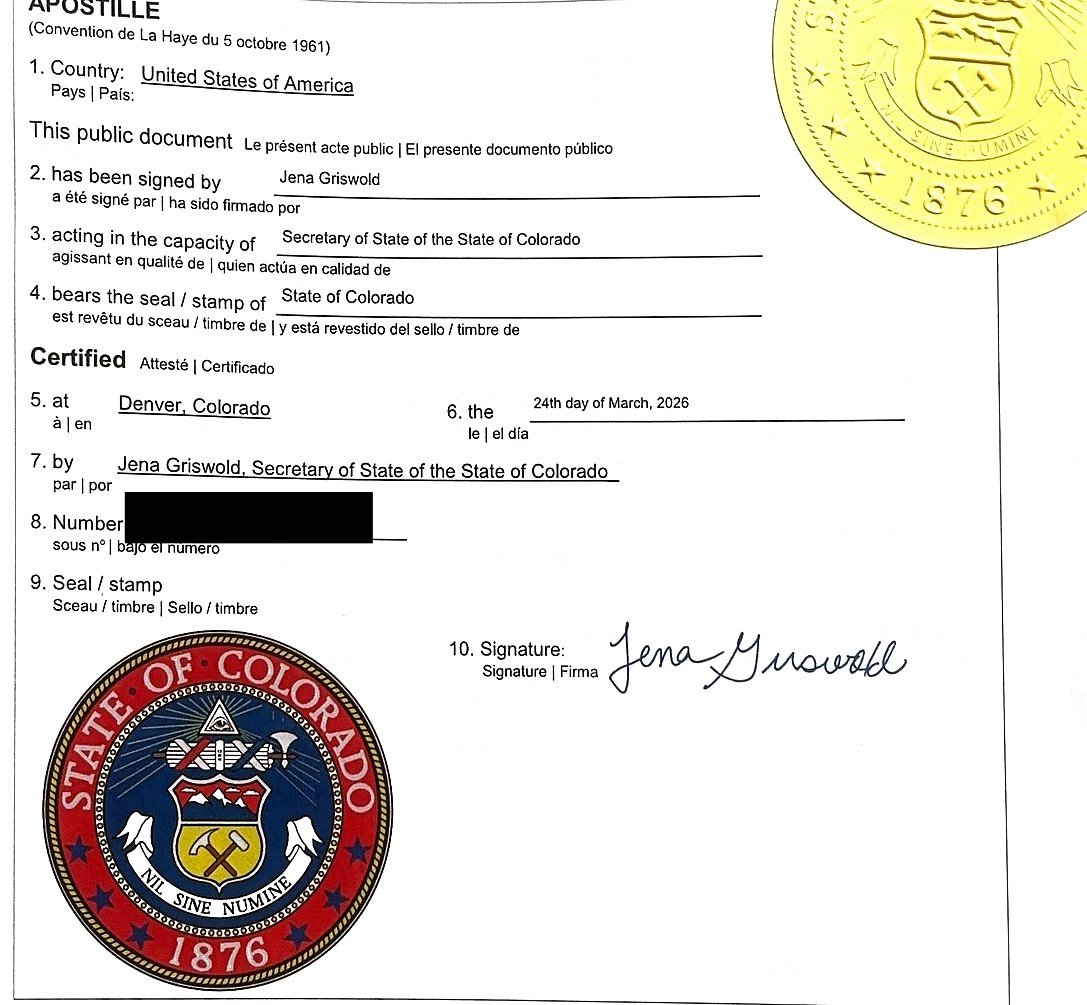 A completed apostille certificate issued by a U.S. Secretary of State, with the serial number redacted